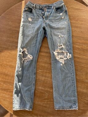 Levi's High-Rise Distressed Light Blue Denim Jeans